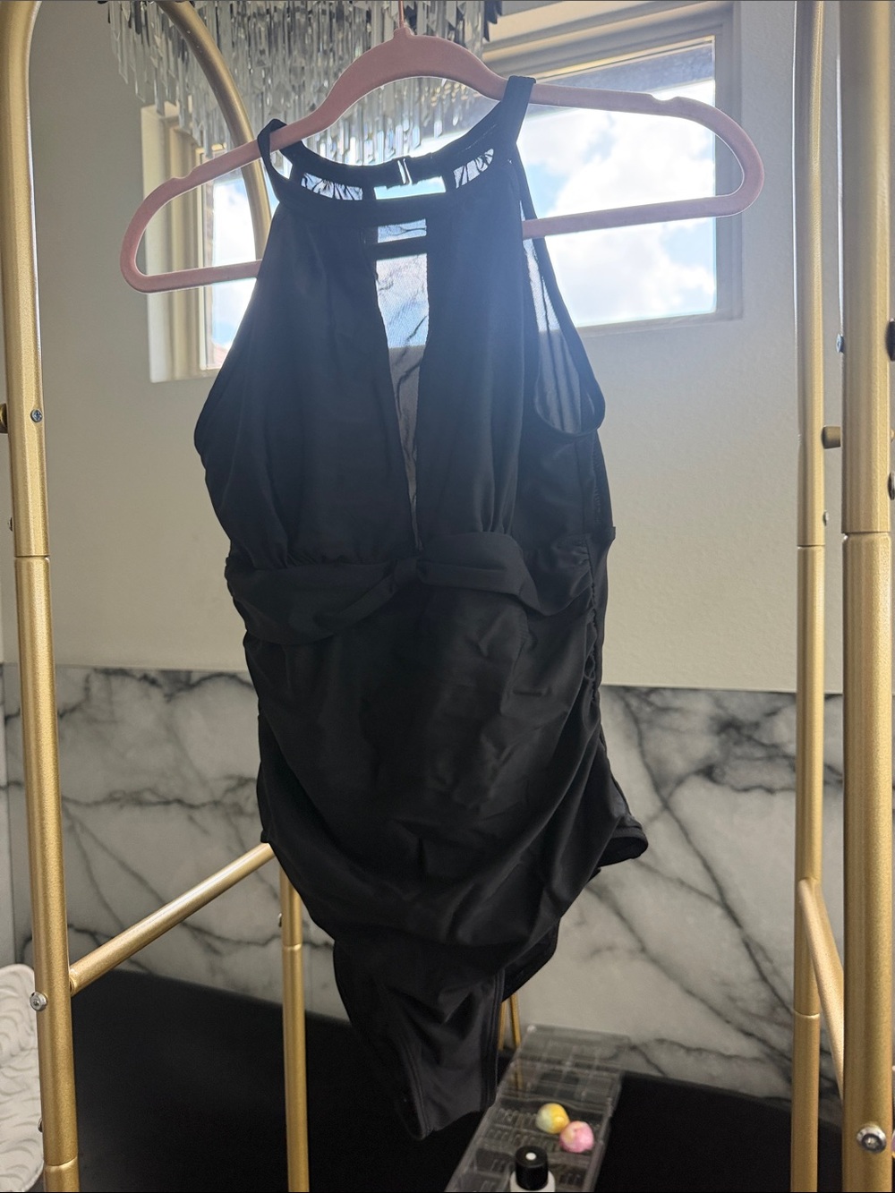 High-Neck Black One-Piece Swimsuit with Sheer Panel